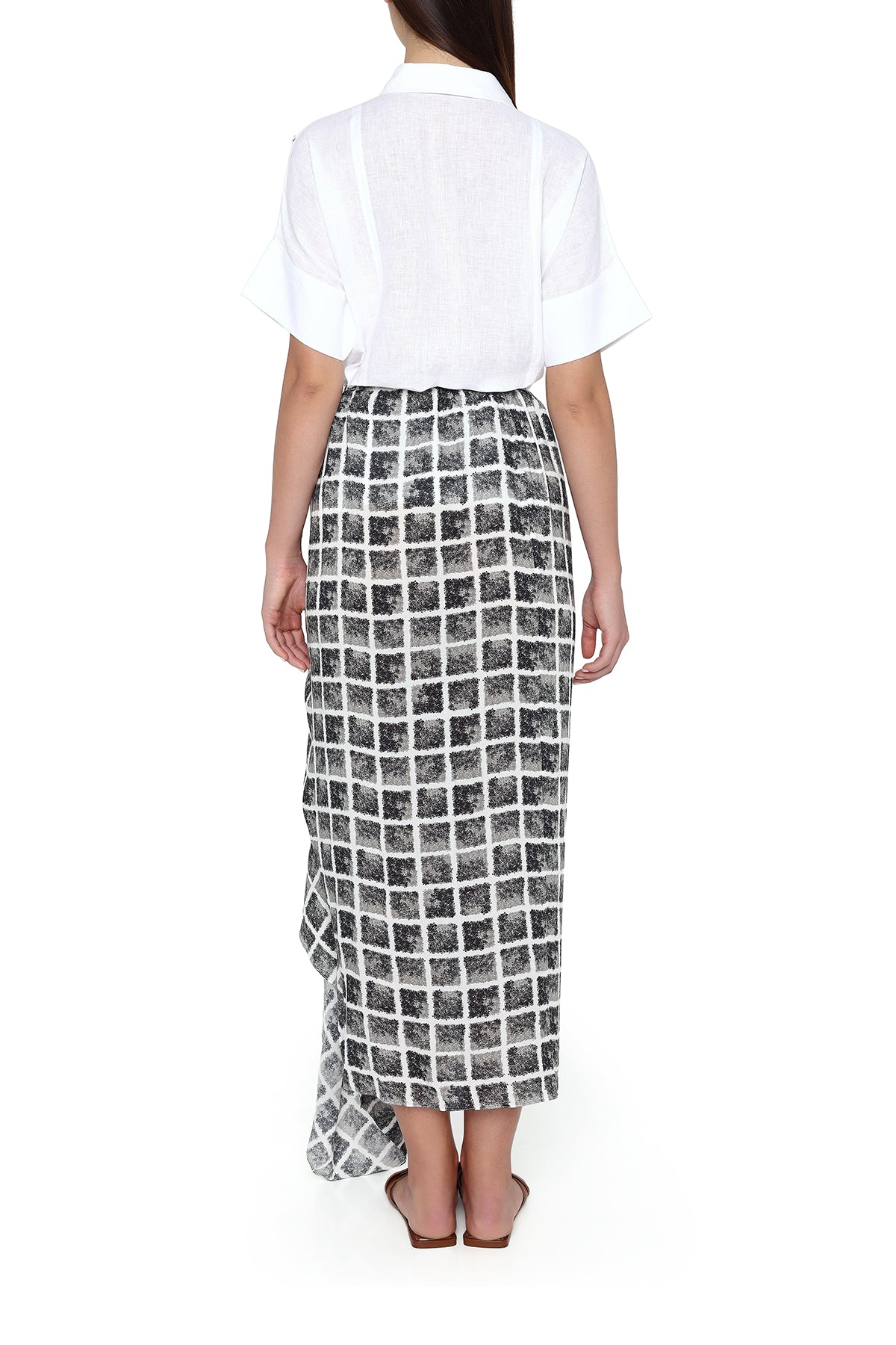 white shirt black and white checkered skirt